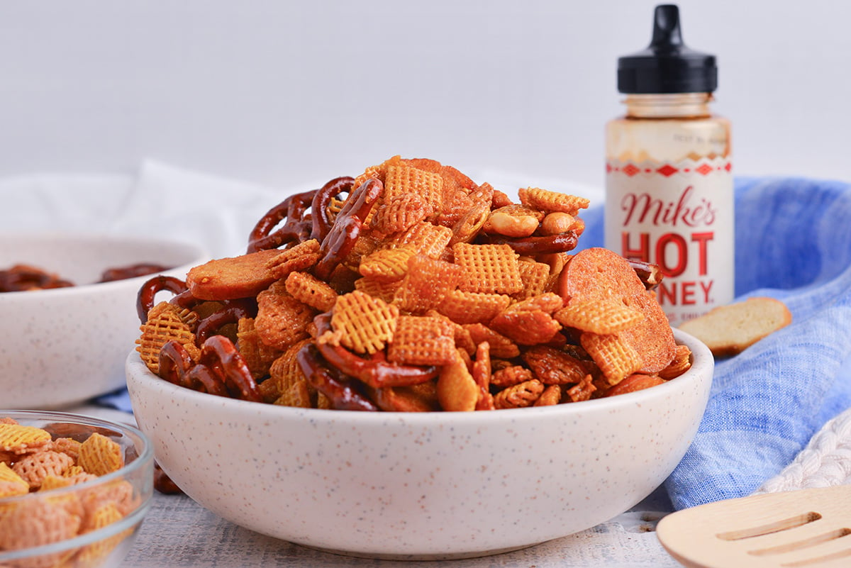 straight on shot of bowl of hot honey snack mix
