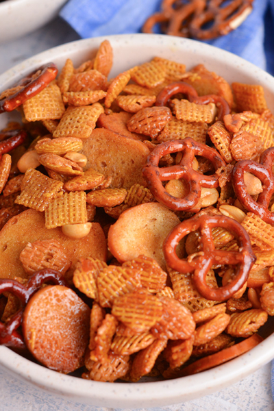 close up angled shot of bowl of hot honey snack mix