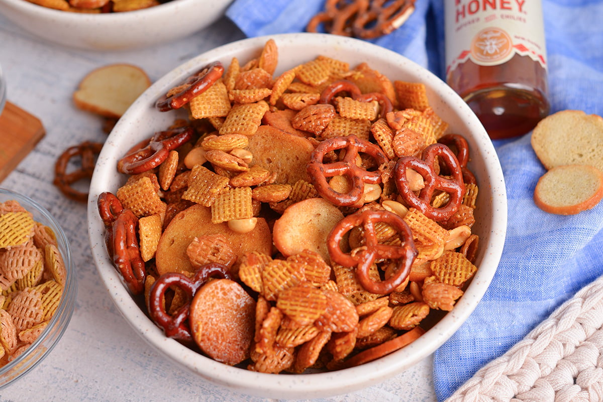 close up angled shot of bowl of hot honey snack mix