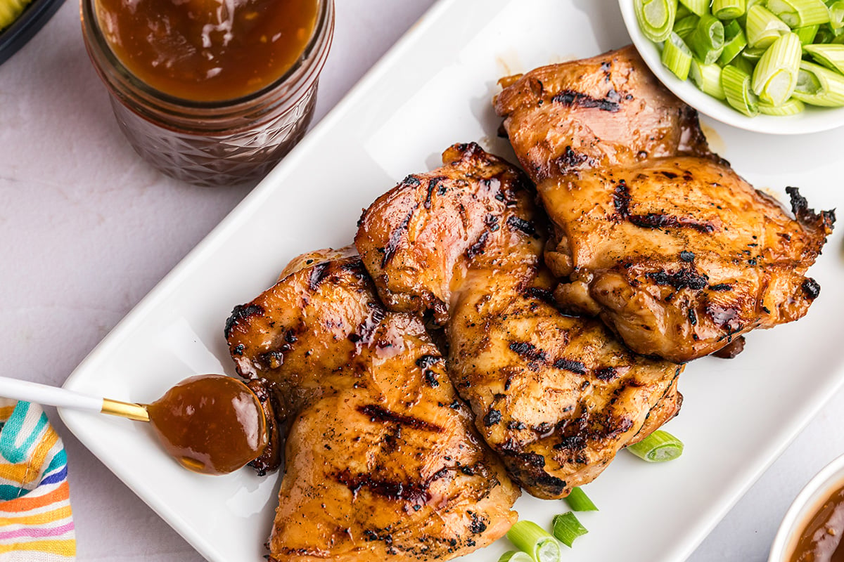 overhead shot of grilled chicken on platter