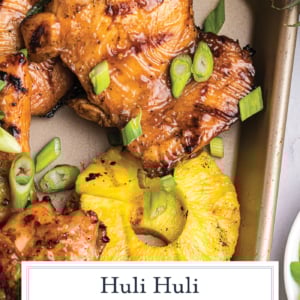 overhead shot of huli huli chicken on pan with text overlay