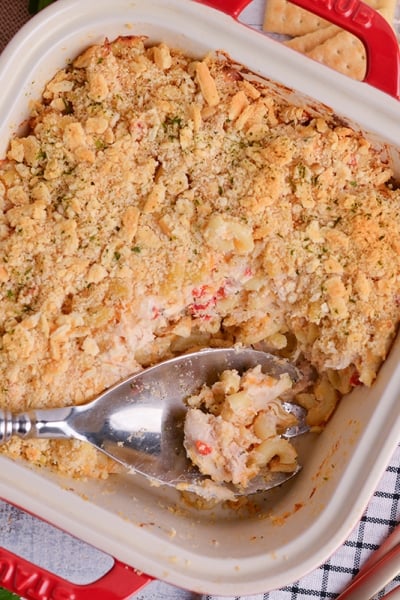 overhead shot of serving spoon in dish of huntington chicken casserole