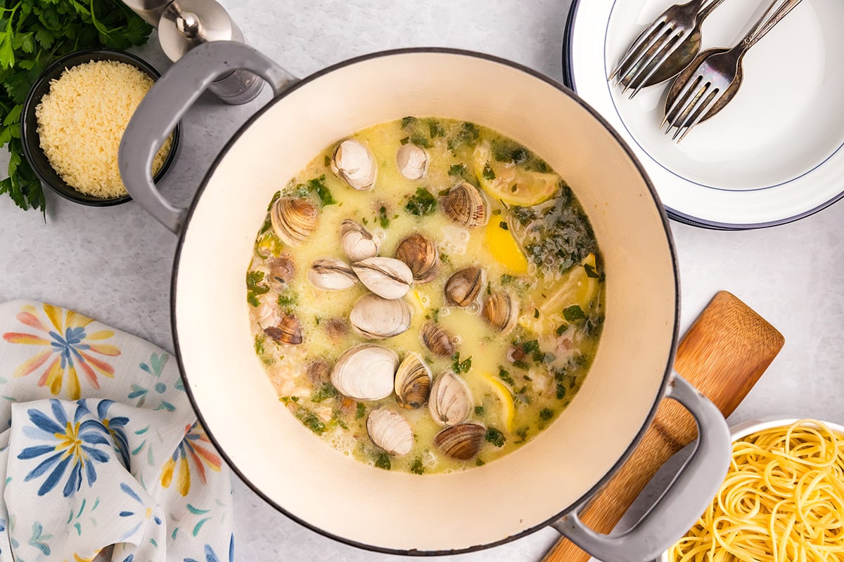 overhead shot of white clam sauce in pot