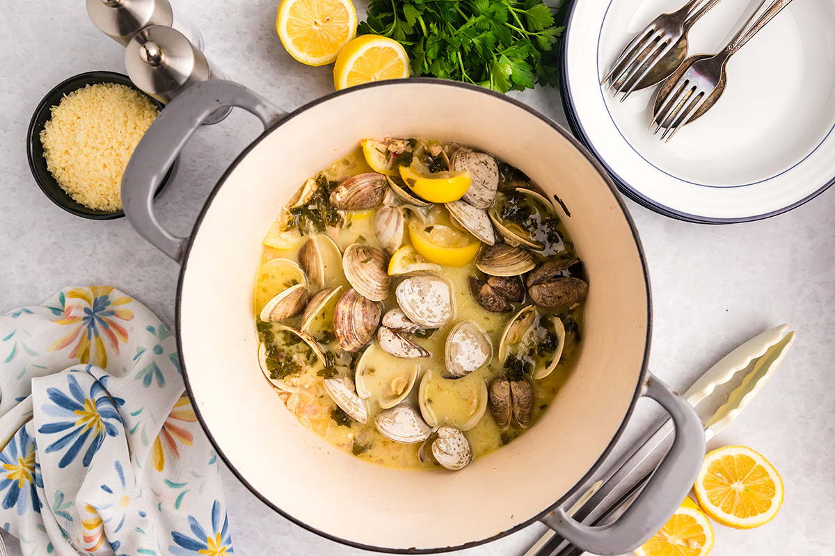 overhead shot of clams cooking in sauce