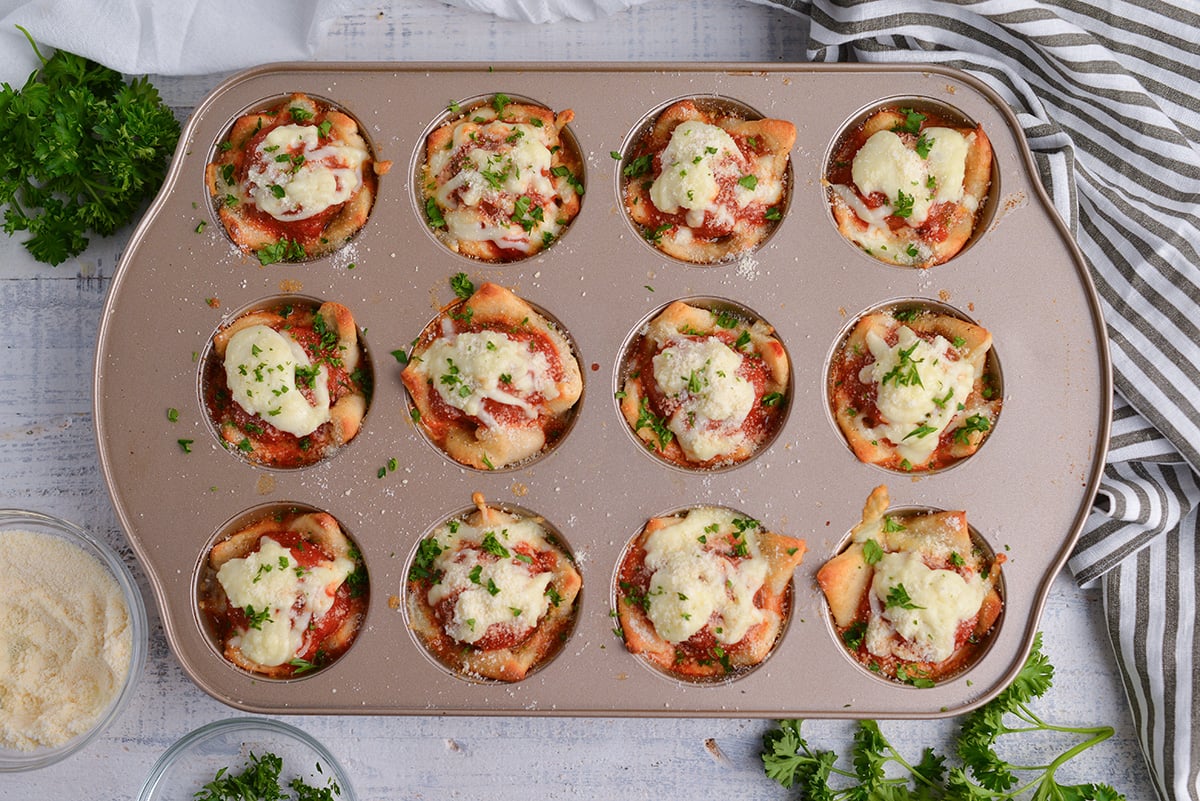 overhead shot of tray of cheesy meatball bombs