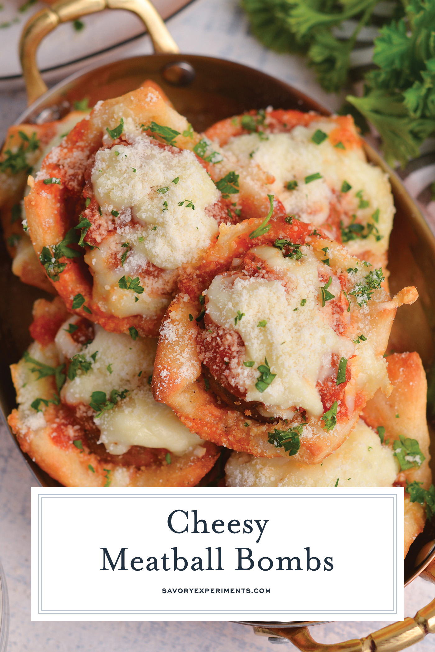 overhead shot of bowl of cheesy meatball bombs with text overlay