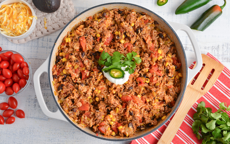 overhead shot of mexican ground beef casserole in pan