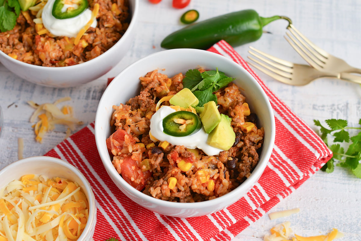 angled shot of bowl of mexican ground beef casserole