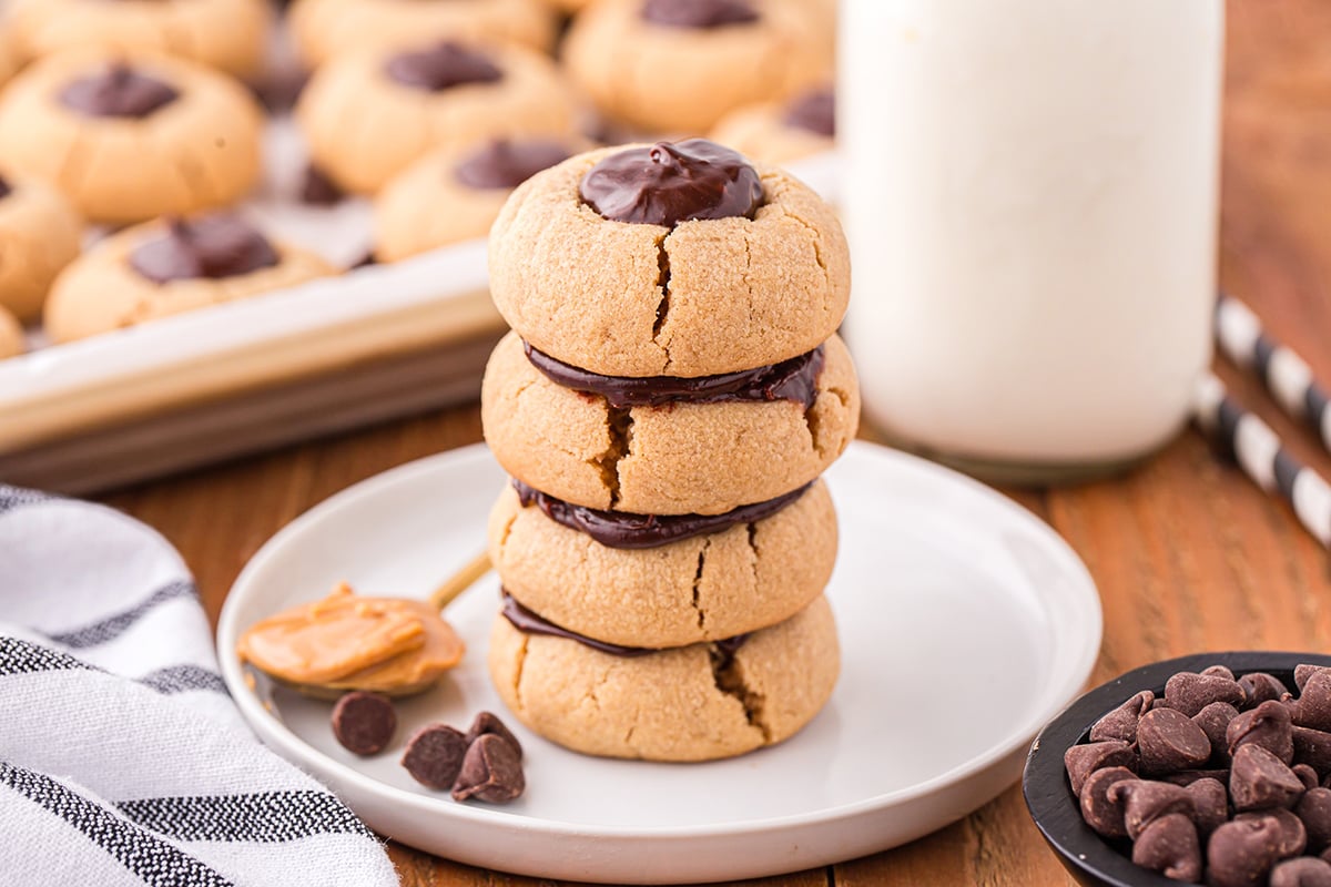 straight on shot of stack of peanut butter thumbprint cookies