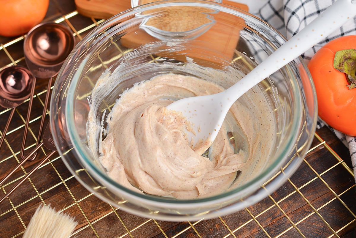 angled shot of maple icing in bowl