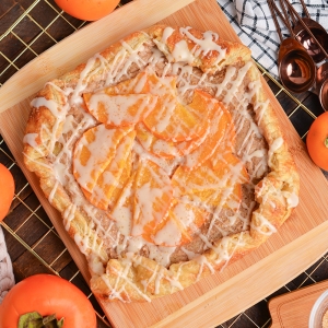 overhead shot of persimmon pastry on cutting board