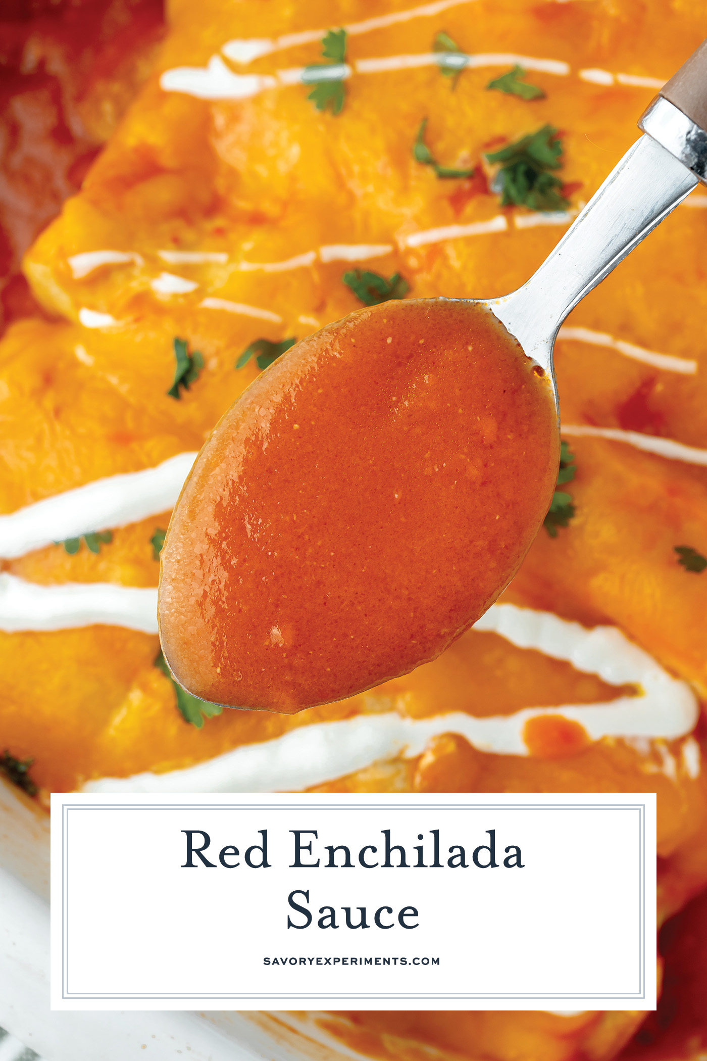 angled shot of spoon of red enchilada sauce with text overlay