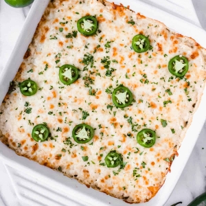 overhead shot of salsa verde chicken casserole in dish