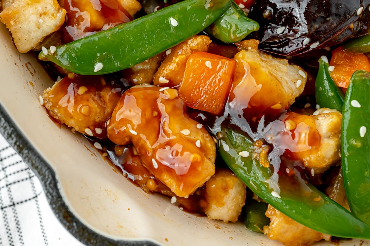 close up overhead shot of szechuan chicken in pan