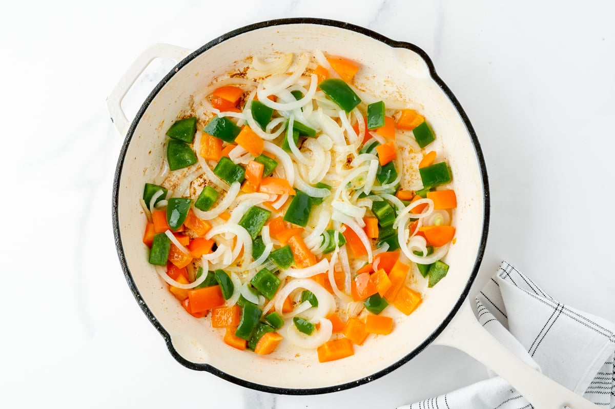 veggies cooking in pan