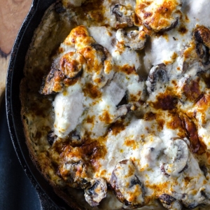 overhead shot of mushroom chicken casserole in skillet