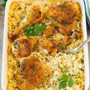 angled shot of chicken and rice casserole in baking dish