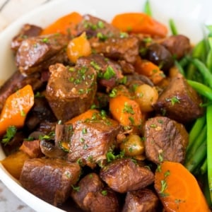 angled shot of bowl of beef bourguignon