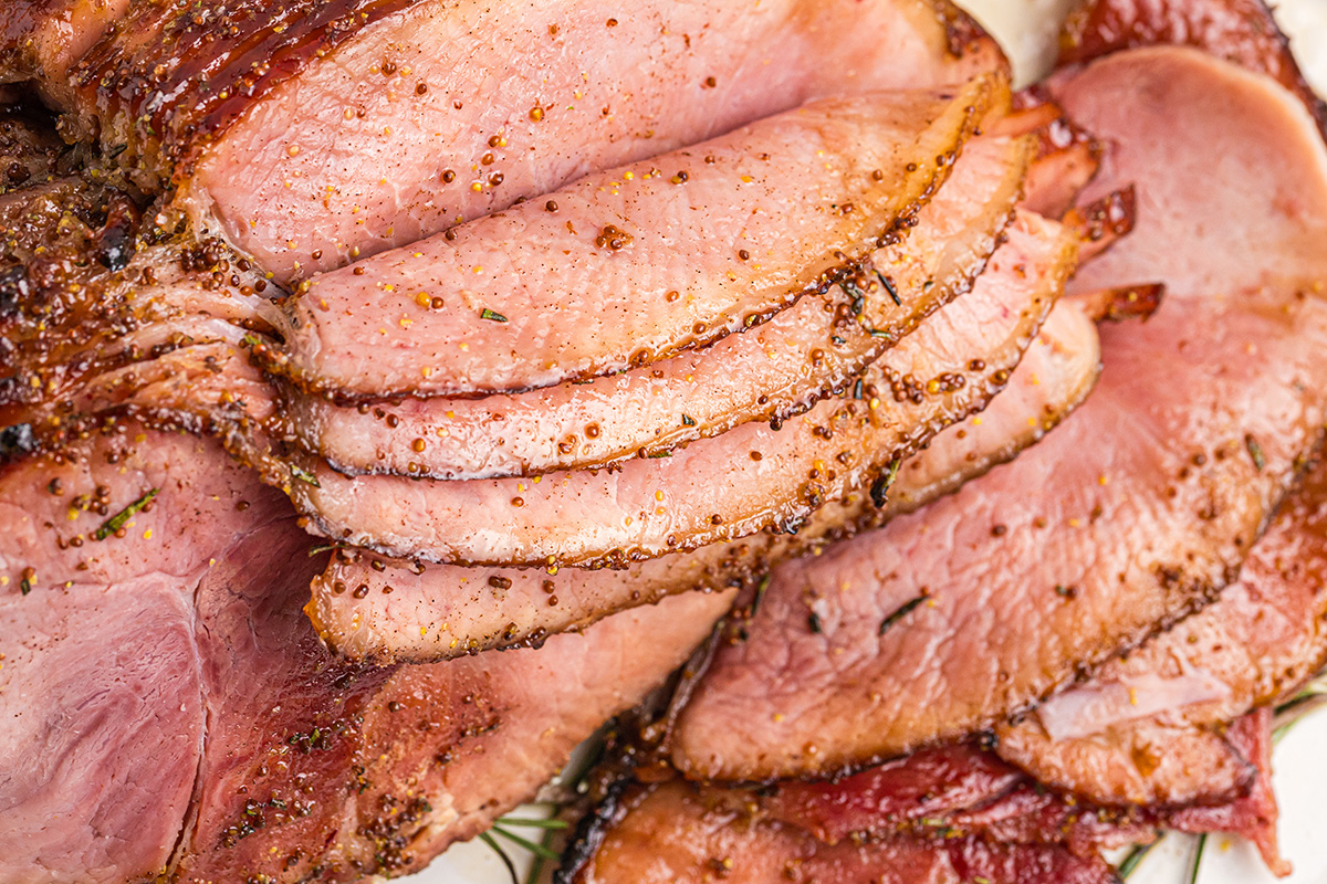 overhead shot of slices of mustard brown sugar ham