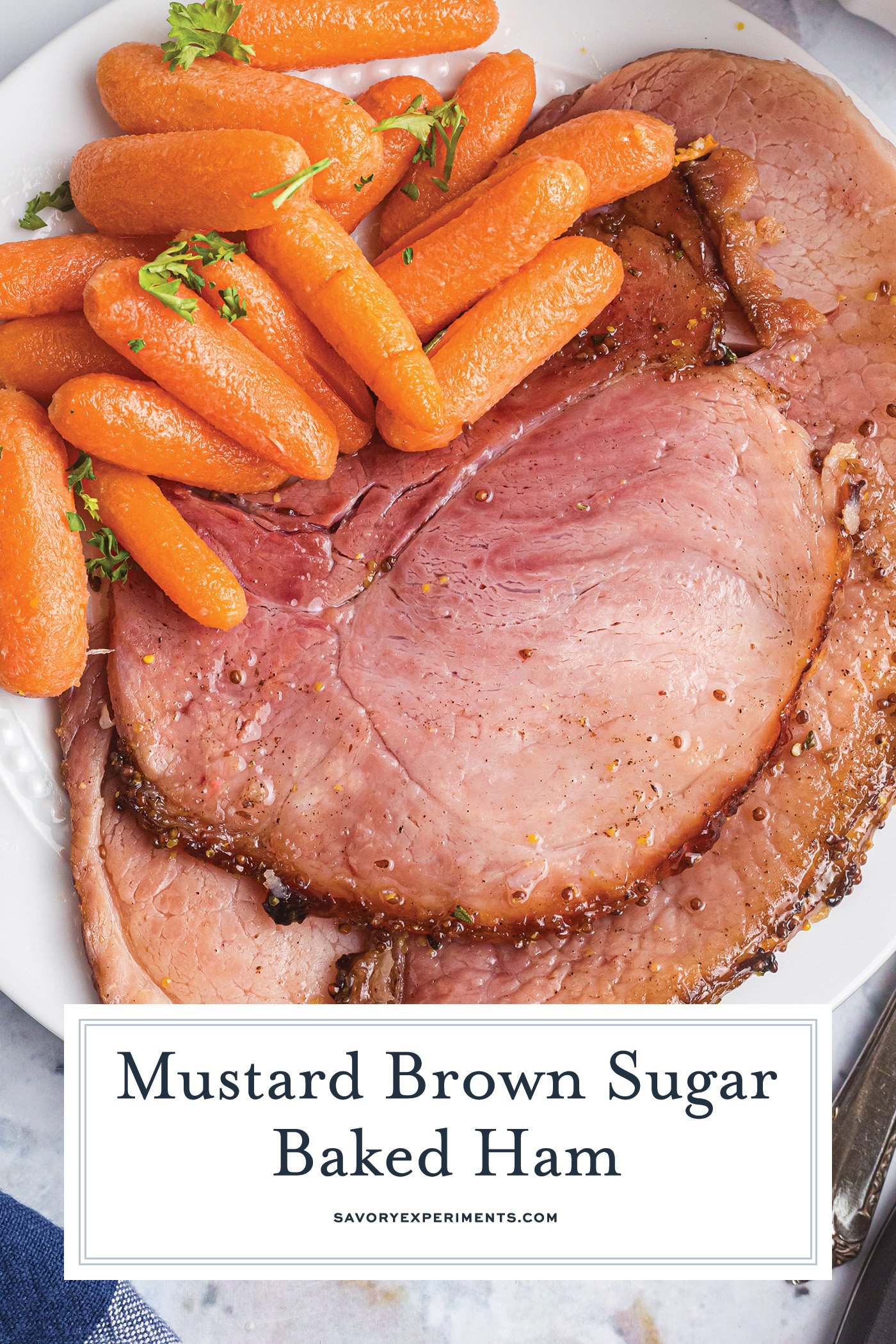 overhead shot of sliced ham on plate with carrots with text overlay