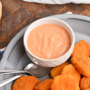 angled shot of bowl of chicken nugget dipping sauce