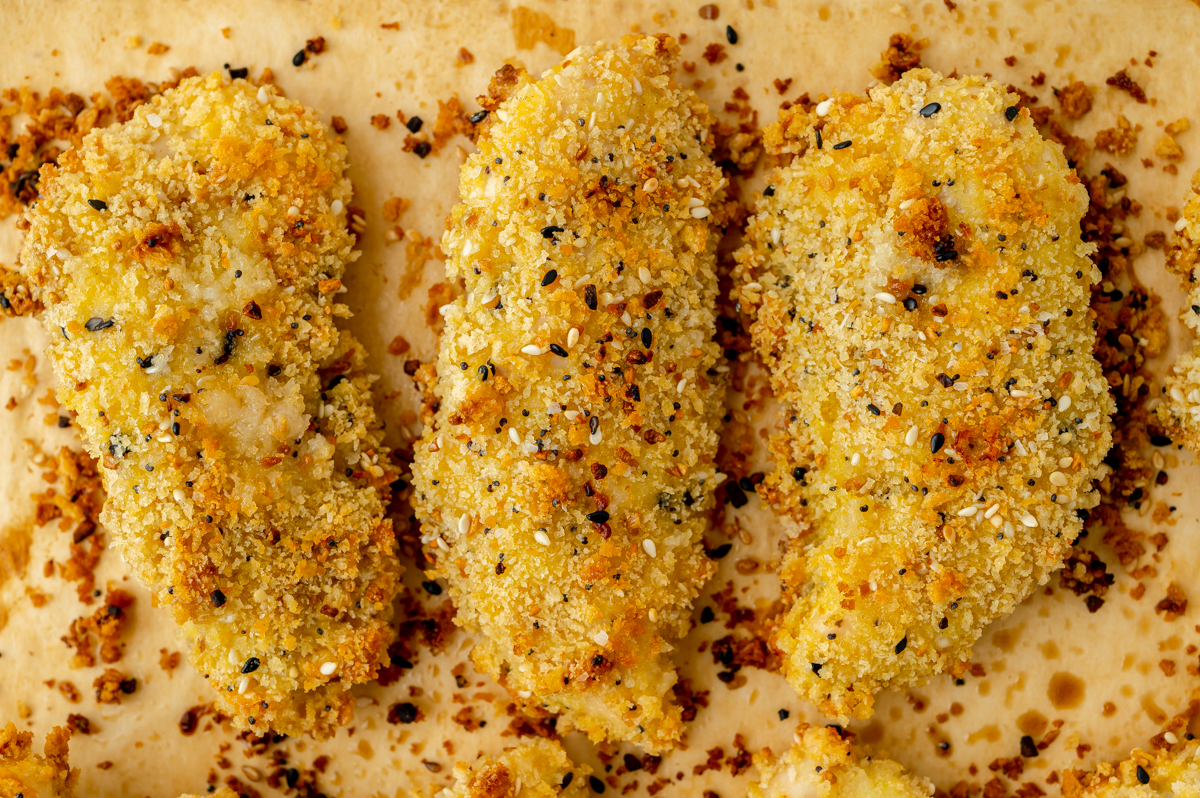 close up overhead shot of everything seasoning chicken tenders