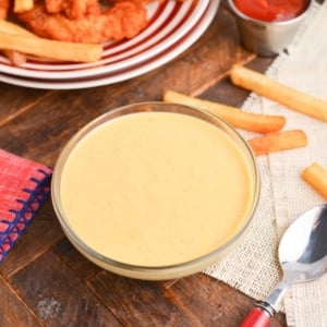 angled shot of bowl of honey mustard sauce