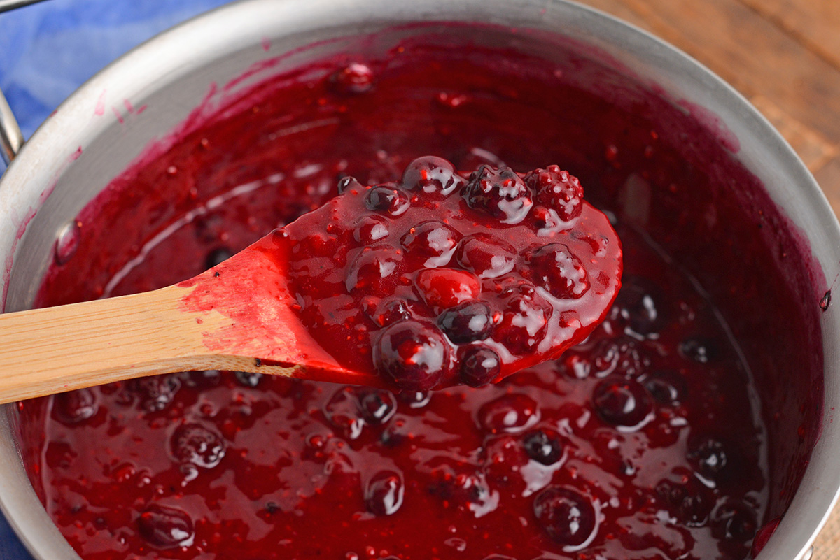 berry filling on wooden spoon