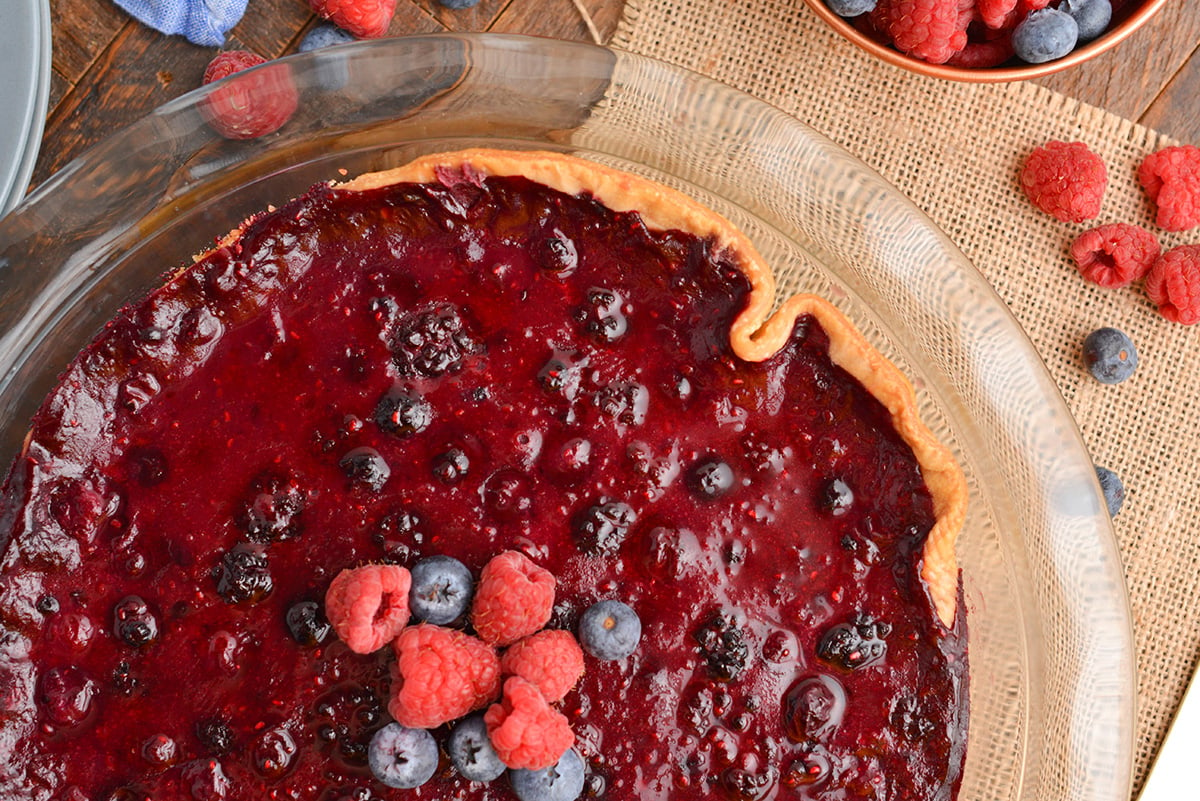 half overhead shot of mixed berry pie