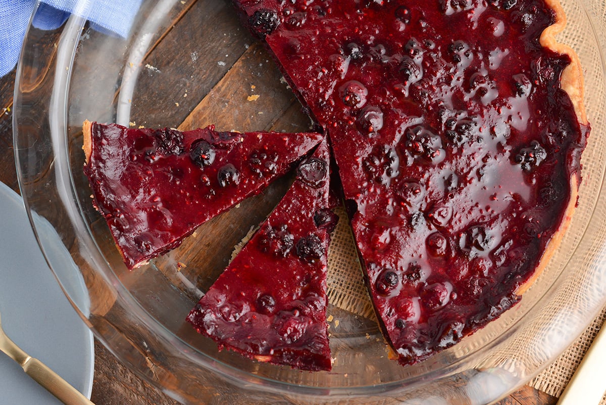 overhead shot of sliced mixed berry pie