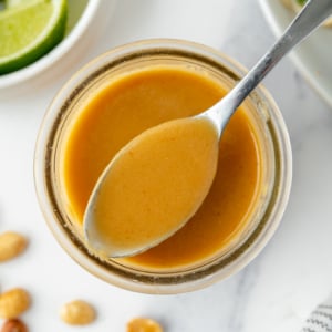 overhead shot of pad thai sauce in jar