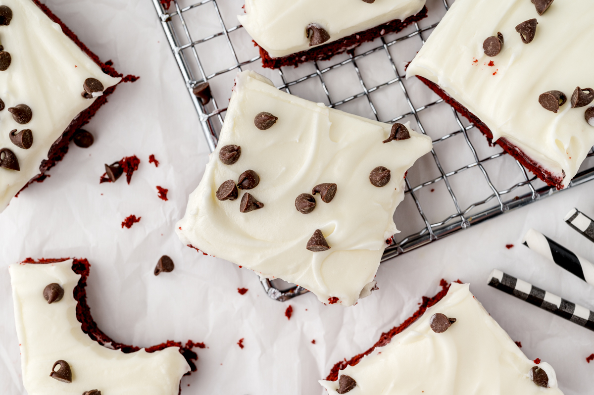 cut squares of frosted homemade brownies