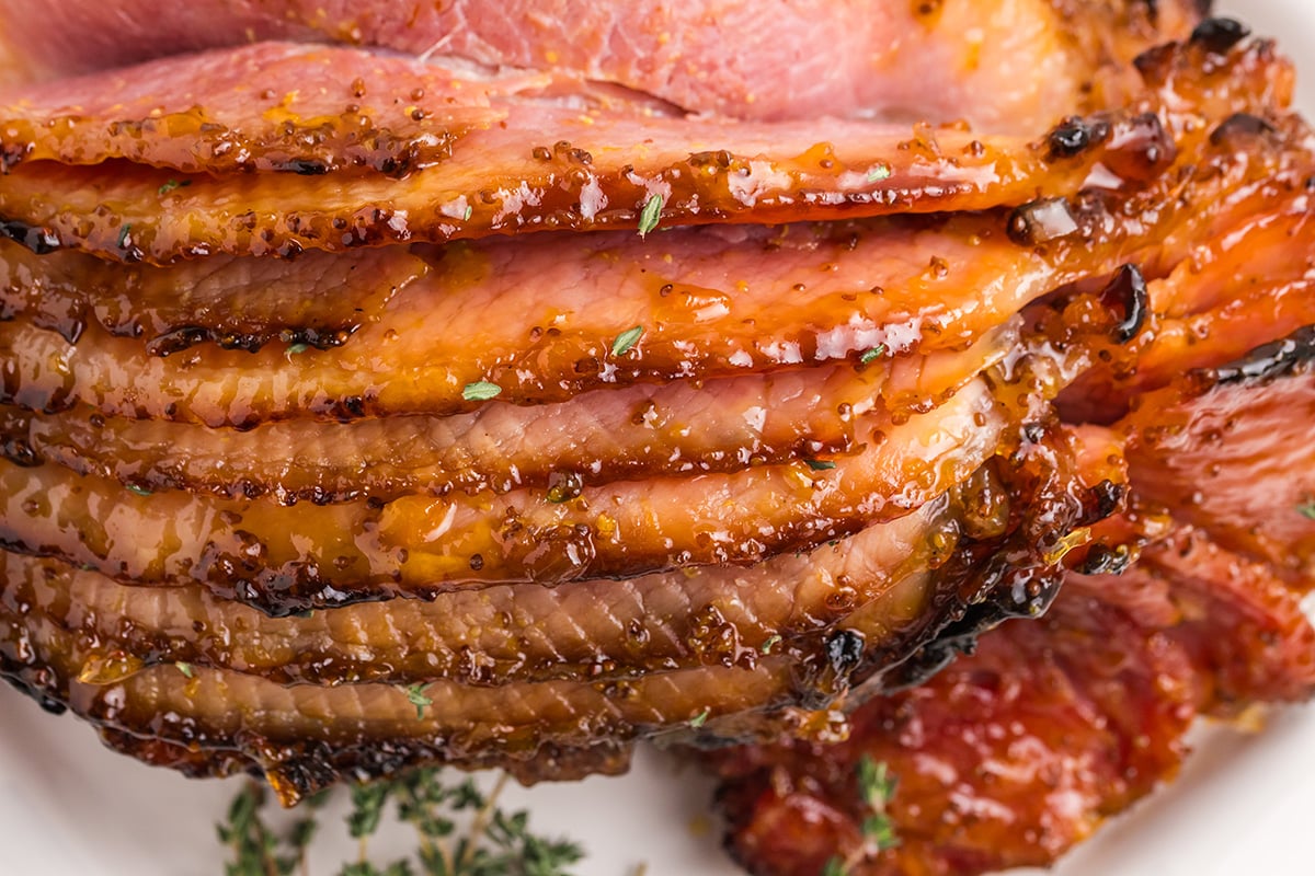 straight on shot of sliced riesling peach glazed ham