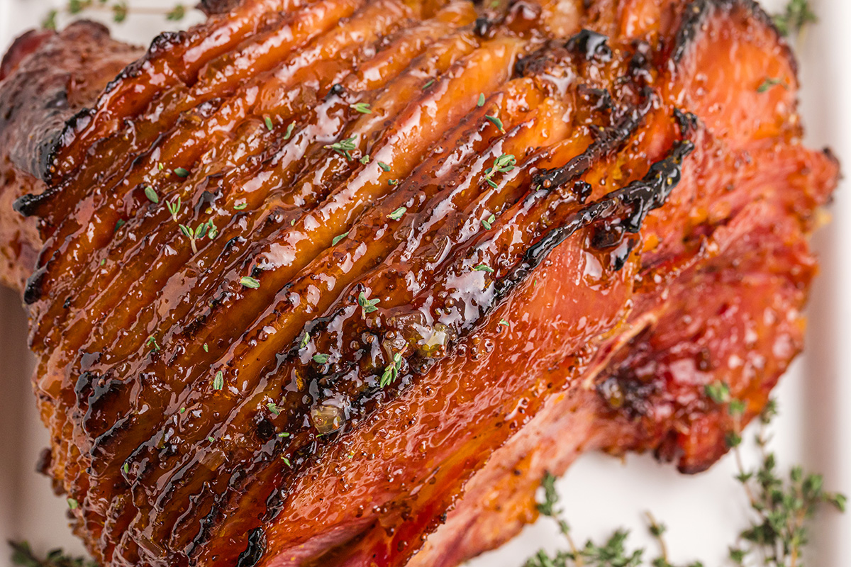 close up angled shot of sliced Riesling peach glazed ham