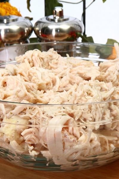 angled shot of bowl of shredded chicken