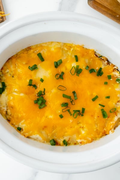 overhead shot of cooked slow cooker potatoes au gratin