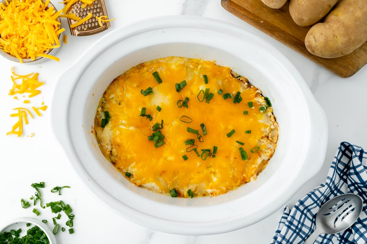 overhead shot of cooked slow cooker potatoes au gratin