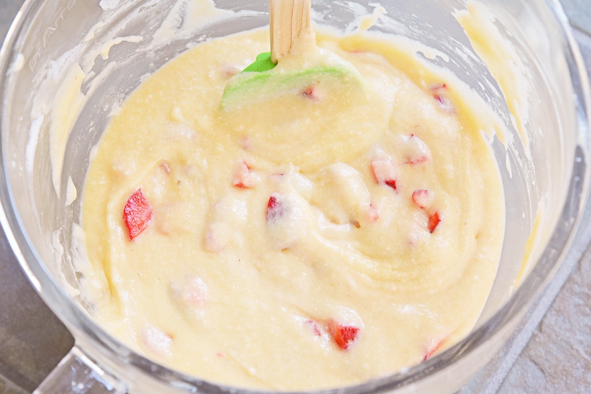 cake batter for vanilla pound cake with fresh strawberries