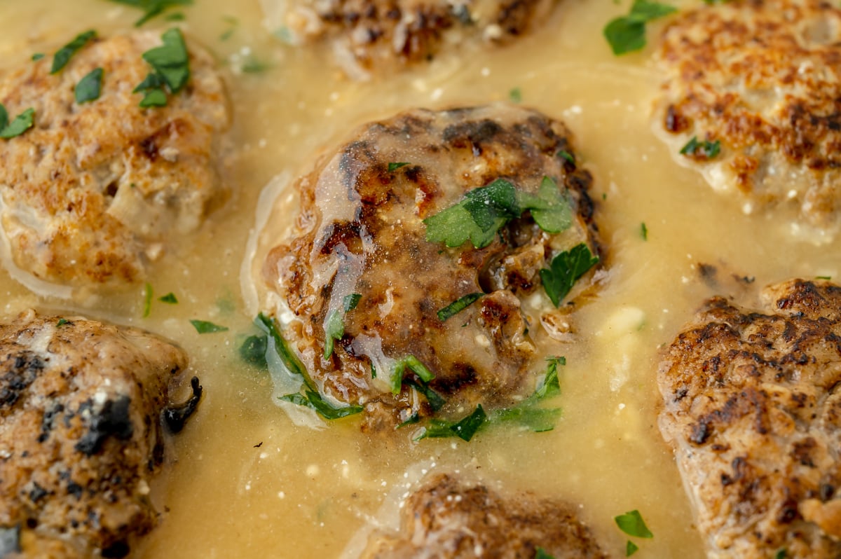 close up shot of swedish meatball in sauce