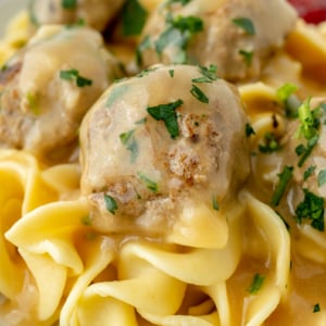 close up straight on shot of swedish meatballs on noodles