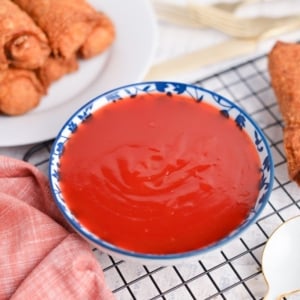 angled shot of bowl of sweet and sour sauce
