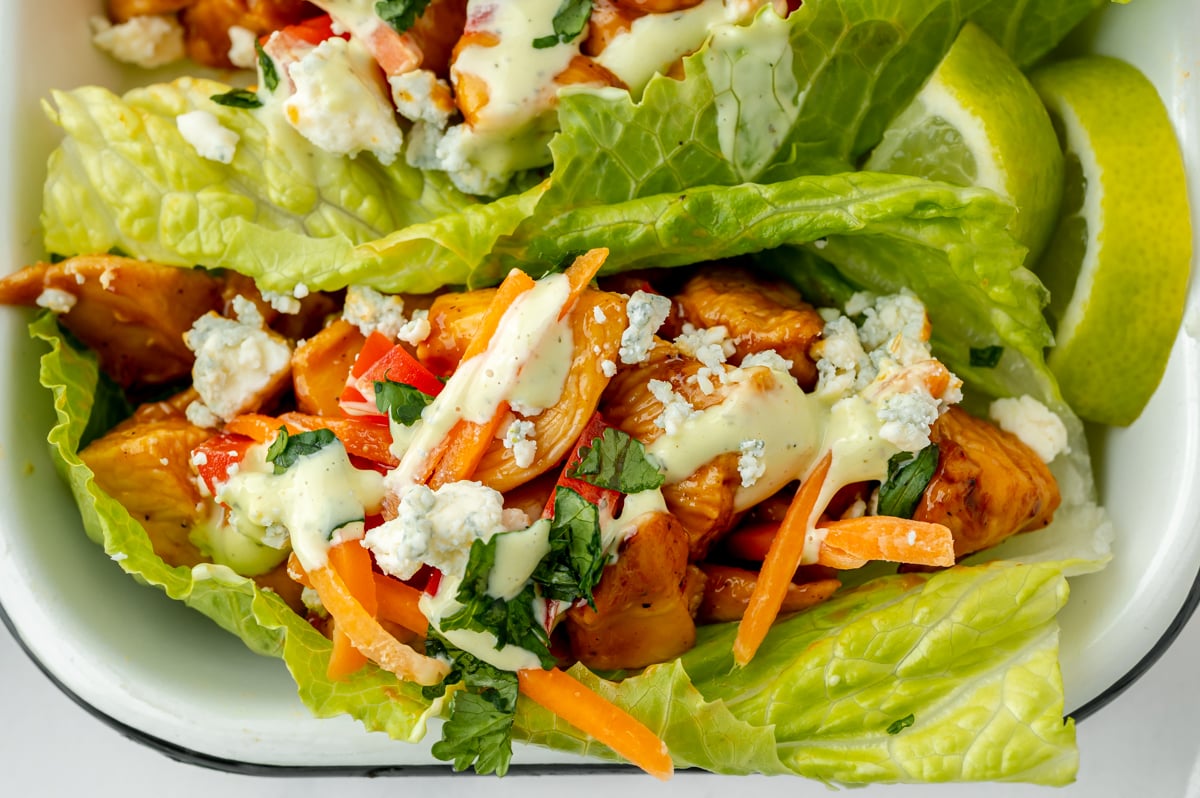 overhead shot of bbq chicken lettuce wrap in tray