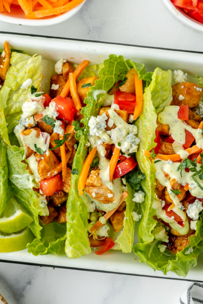 overhead shot of tray of bbq chicken lettuce wraps