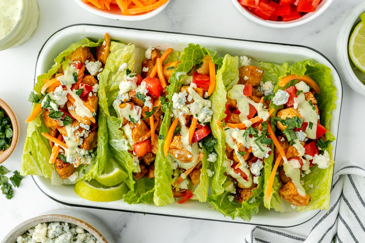 overhead shot of tray of bbq chicken lettuce wraps