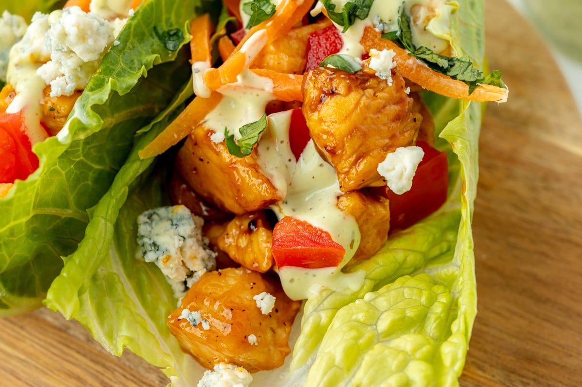close up shot of bbq chicken lettuce wrap
