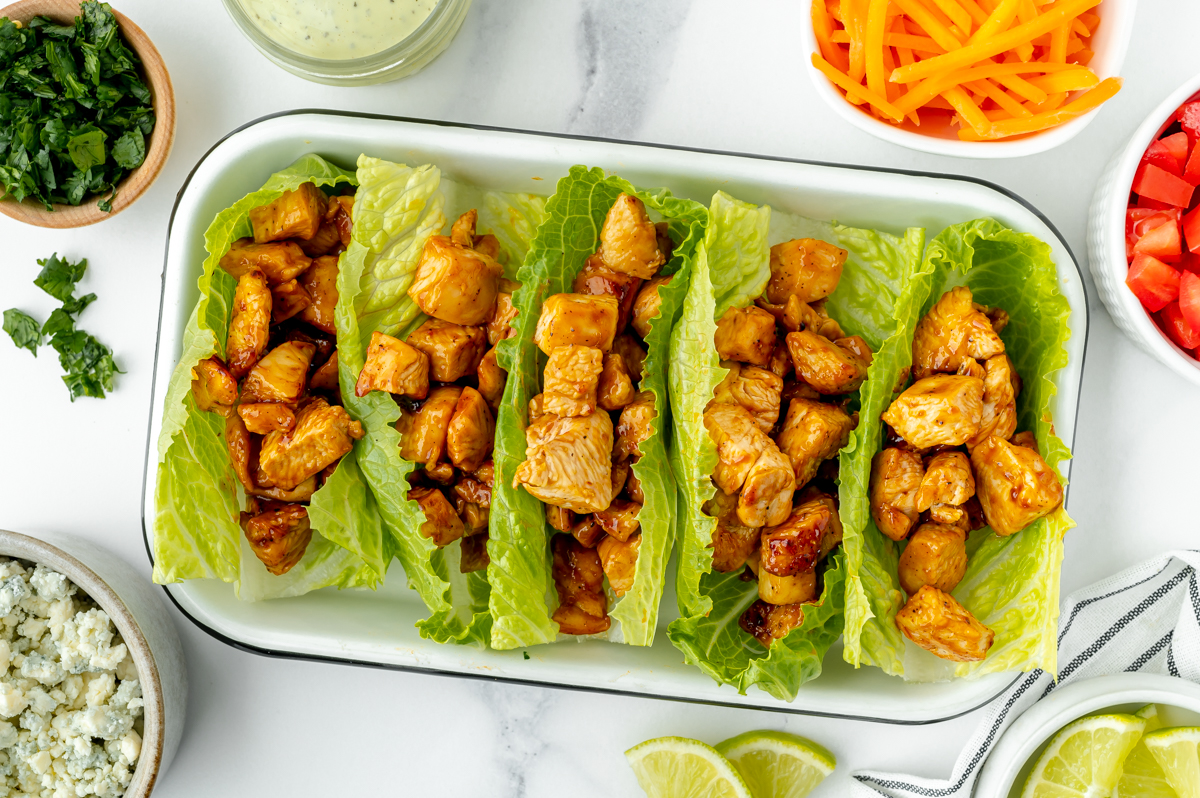 bbq chicken in lettuce wraps in tray