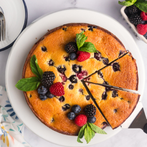 overhead shot of sliced berry ricotta cheesecake