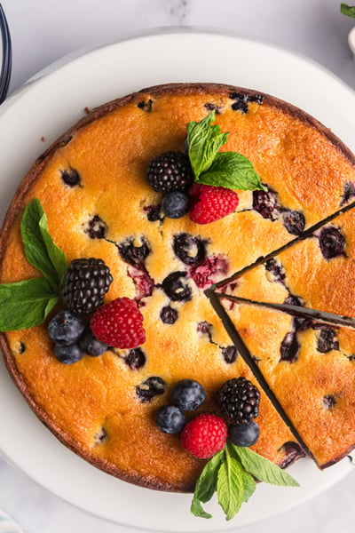 overhead shot of sliced berry ricotta cheesecake