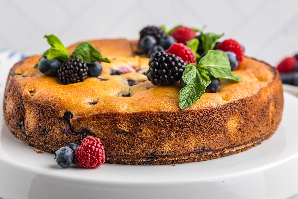 angled shot of berry ricotta cheesecake