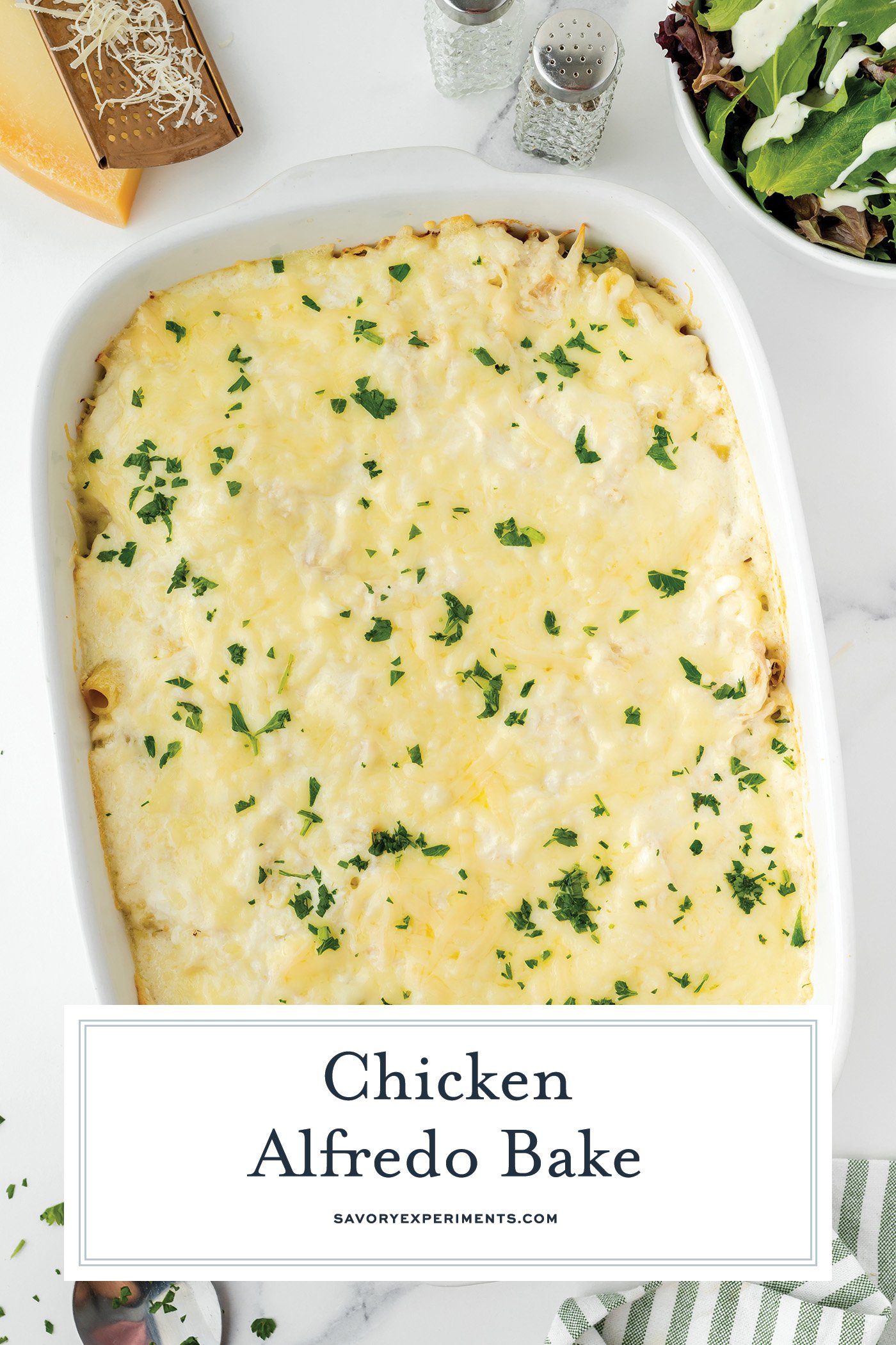 overhead shot of pan of chicken alfredo bake with text overlay
